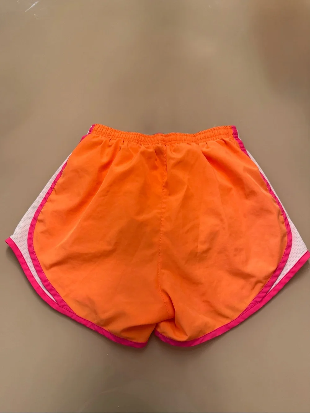 Nike Girl’s Dri-Fit Orange Shorts with Pink Trim
